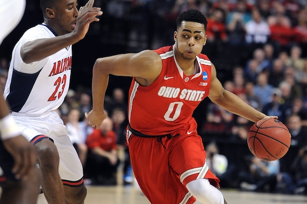 Ohio State guard D'Angelo Russell, right, drives on Arizona forward Rondae Hollis-Jefferson during an NCAA college basketball tournament round of 32 game in Portland, Ore., Saturday, March 21, 2015. (AP Photo/Greg Wahl-Wtephens)