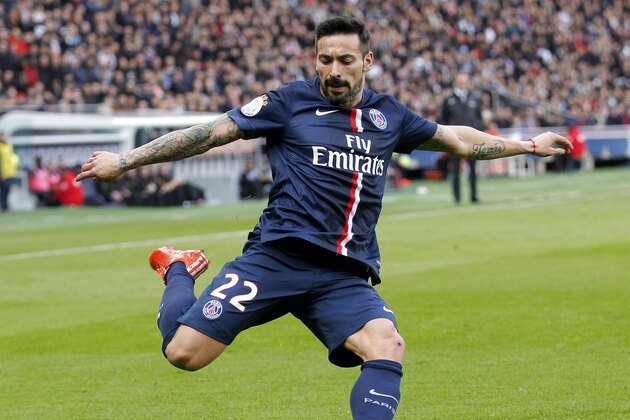 PSG's Argentinian Ezequiel Lavezzi, controls the ball during a League One soccer match Paris Saint Germain against Lens at Parc des Prince stadium in Paris, France, Saturday, March 7, 2015. (AP Photo/Michel Euler)