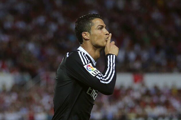 Real Madrid's Cristiano Ronaldo celebrates his goal during a Spanish La Liga soccer match between Sevilla and Real Madrid at the Ramon Sanchez Pizjuan stadium in Sevilla, Spain, Saturday, May 2, 2015. (AP Photo/Andres Kudacki)