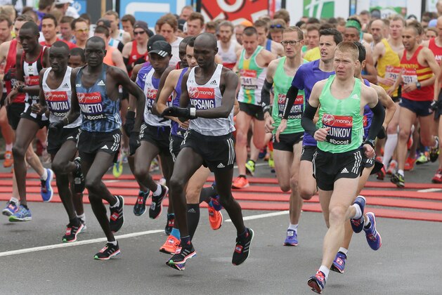 Runners in the elite Men's race start the 35th London Marathon on Blackheath, London  Sunday, April 26, 2015. (AP Photo/Tim Ireland)