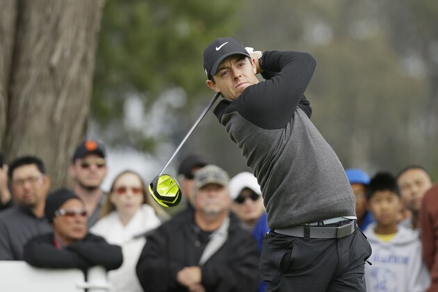 Rory McIlroy, of Northern Ireland, hits from the 15th tee of TPC Harding Park against Jim Furyk in the semifinals of the Match Play Championship golf tournament Sunday, May 3, 2015, in San Francisco. McIlroy won the match 1 up. (AP Photo/Eric Risberg)
