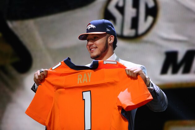 CHICAGO, IL - APRIL 30:  Shane Ray of the Missouri Tigers holds up a jersey after being picked #23 overall by the Denver Broncos during the first round of the 2015 NFL Draft at the Auditorium Theatre of Roosevelt University on April 30, 2015 in Chicago, Illinois.  (Photo by Jonathan Daniel/Getty Images)
