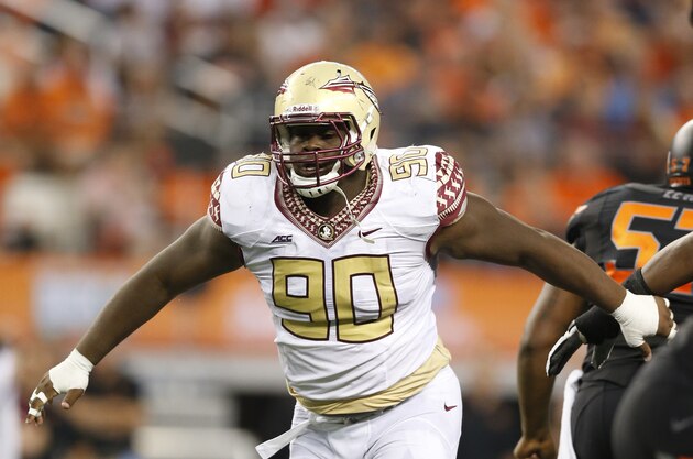 Aug 30, 2014; Arlington, TX, USA; Florida State Seminoles defensive tackle Eddie Goldman (90) in action against the Oklahoma State Cowboys at AT&T Stadium. Mandatory Credit: Matthew Emmons-USA TODAY Sports