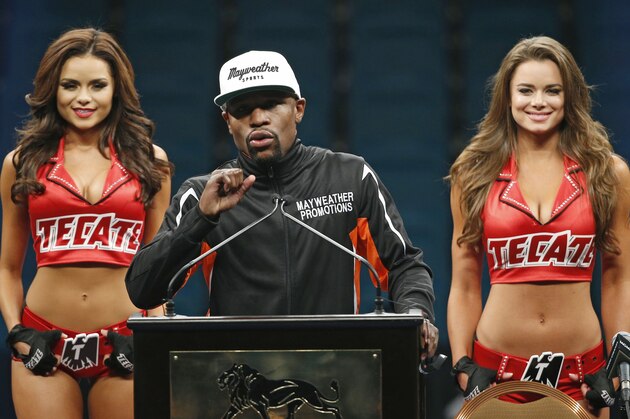 Floyd Mayweather Jr. answers reporter questions during a press conference following his welterweight title fight against Manny Pacquiao on Saturday, May 2, 2015 in Las Vegas. Mayweather defeated Pacquiao in a unanimous decision. (AP Photo/John Locher)