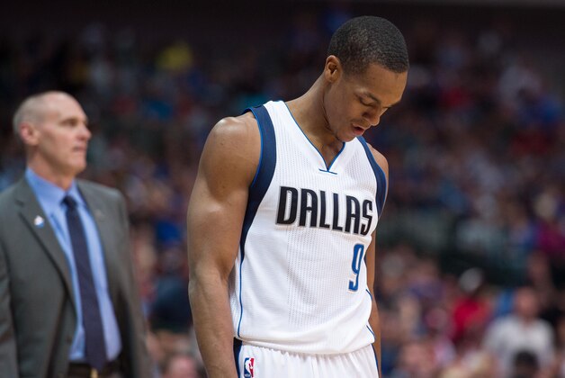 Apr 2, 2015; Dallas, TX, USA; Dallas Mavericks head coach Rick Carlisle and guard Rajon Rondo (9) during the game against the Houston Rockets at the American Airlines Center. The Rockets defeated the Mavericks 108-101. Mandatory Credit: Jerome Miron-USA TODAY Sports