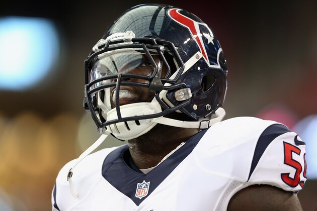 GLENDALE, AZ - AUGUST 09:  Outside linebacker Whitney Mercilus #59 of the Houston Texans stands on the sidelines during the preseason NFL game against the Arizona Cardinals at the University of Phoenix Stadium on August 9, 2014 in Glendale, Arizona.  The Cardinals defeated the Texans 32-0.  (Photo by Christian Petersen/Getty Images)