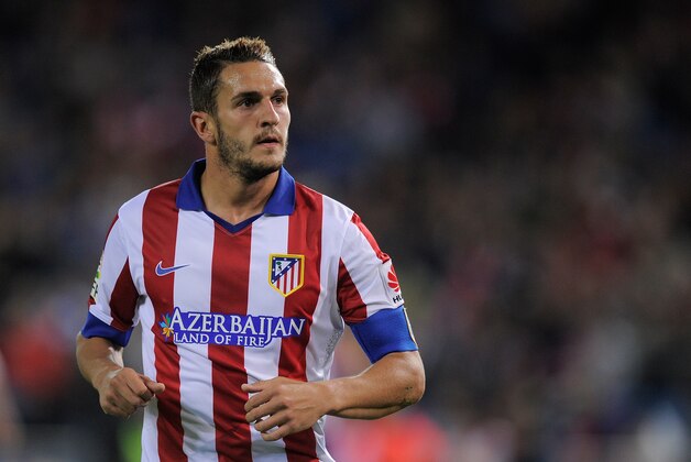 MADRID, SPAIN - APRIL 07:  Koke Resurreccion of Club Atletico de Madrid looks on during the La Liga match between Club Atletico de Madrid and Real Sociedad at Vicente Calderon Stadium on April 7, 2015 in Madrid, Spain.  (Photo by Denis Doyle/Getty Images)