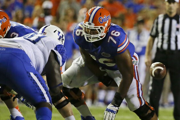 Florida offensive linesman Max Garcia (76) prepares to block a Kentucky  defender during the first half of an NCAA college football game in Gainesville, Fla., Saturday, Sept. 13, 2014. (AP Photo/John Raoux)