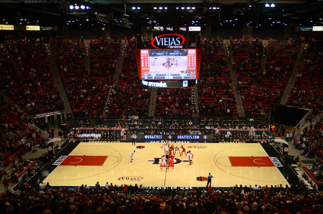 SAN DIEGO, CA - NOVEMBER 14:  Skylar Spencer #0 of the San Diego State Aztecs controls possession of the ball off the opening tip-off of the first half of the game against Malik Pope #21 of the Cal-State Northridge Matadors at Viejas Arena on November 14, 2014 in San Diego, California. (Photo by Kent C. Horner/Getty Images)