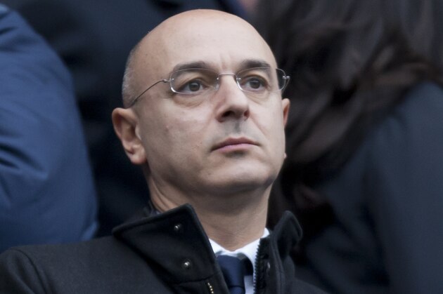 Tottenham's chairman Daniel Levy takes his seat before his team's 6-0 loss at Manchester City in their English Premier League soccer match at the Etihad Stadium, Manchester, England, Sunday Nov. 24, 2013. (AP Photo/Jon Super)