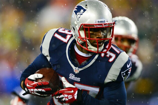 Jan 11, 2014; Foxborough, MA, USA; New England Patriots cornerback Alfonzo Dennard (37) intercepts a pass intended for Indianapolis Colts wide receiver LaVon Brazill (not pictured) during the first quarter of the 2013 AFC divisional playoff football game at Gillette Stadium. Mandatory Credit: Andrew Weber-USA TODAY Sports