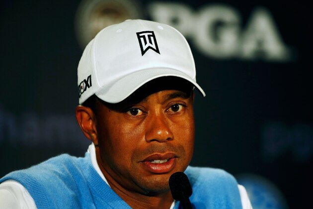 ROCHESTER, NY - AUGUST 06:  Tiger Woods of the United States is interviewed during a press conference prior to the start of the 95th PGA Championship at Oak Hill Country Club on August 6, 2013 in Rochester, New York.  (Photo by Scott Halleran/Getty Images)