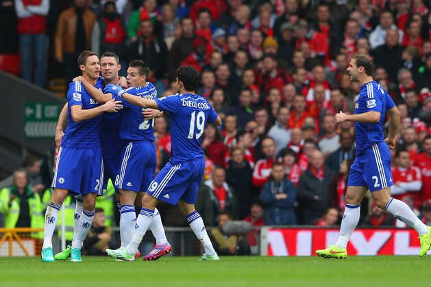 LIVERPOOL, ENGLAND - NOVEMBER 08:  Gary Cahill of Chelsea celebrates with team mates after scoring their first goal during the Barclays Premier League match between Liverpool and Chelsea at Anfield on November 8, 2014 in Liverpool, England.  (Photo by Alex Livesey/Getty Images)