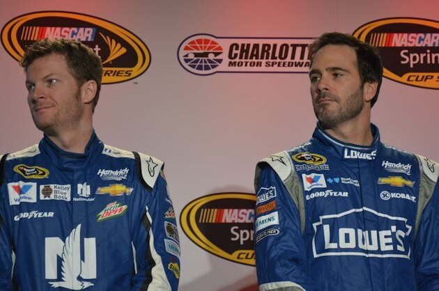 Dale Earnhardt Jr. and Jimmie Johnson wait for media questions at the Charlotte Motor Speedway media tour.