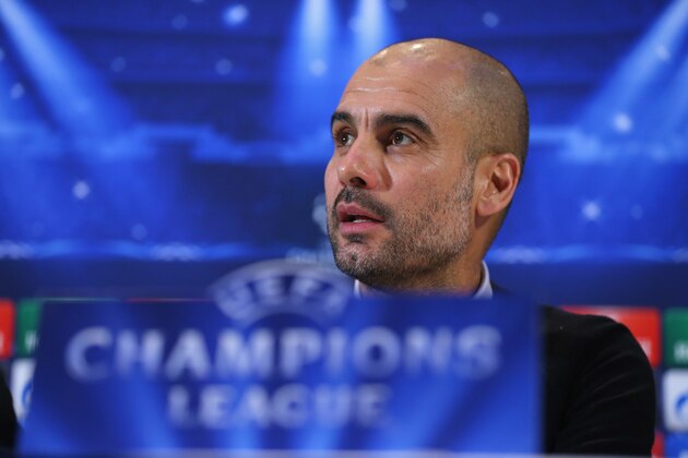 MANCHESTER, ENGLAND - NOVEMBER 24:  Pep Guardiola the coach of FC Bayern Muenchen faces the media during a press conference at the Lowry Hotel on November 24, 2014 in Manchester, United Kingdom.  (Photo by Alex Livesey/Getty Images)