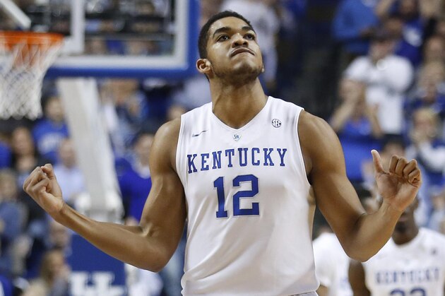 Dec 5, 2014; Lexington, KY, USA; Kentucky Wildcats forward Karl-Anthony Towns (12) celebrates during the game against the Texas Longhorns in the second half at Rupp Arena. Kentucky defeated Texas 63-51. Mandatory Credit: Mark Zerof-USA TODAY Sports