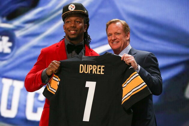CHICAGO, IL - APRIL 30:  Bud Dupree of the Kentucky Wildcats holds up a jersey with NFL Commissioner Roger Goodell after being picked #22 overall by the Pittsburgh Steelers during the first round of the 2015 NFL Draft at the Auditorium Theatre of Roosevelt University on April 30, 2015 in Chicago, Illinois.  (Photo by Jonathan Daniel/Getty Images)