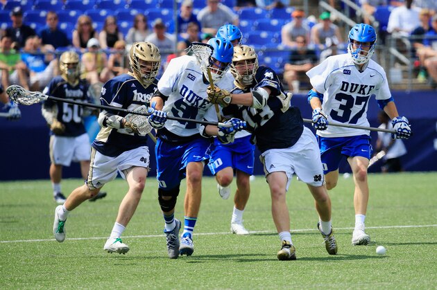 BALTIMORE, MD - MAY 26: Luke Duprey #91 of the Duke Blue Devils and Tyler Brenneman #13 of the Notre Dame Fighting Irish go after the ball during the second half of the 2014 NCAA Division I Men's Lacrosse Championship at M&T Bank Stadium on May 26, 2014 in Baltimore, Maryland.  (Photo by Rob Carr/Getty Images)