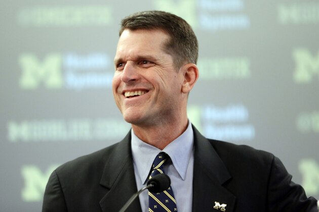 Jim Harbaugh, Michigan's new head football coach, addresses the media after after he was introduced during an NCAA college football news conference Tuesday, Dec. 30, 2014, in Ann Arbor, Mich. (AP Photo/Carlos Osorio) Jim Harbaugh, Michigan's new head football coach, addresses the media after after he was introduced during an NCAA college football news conference Tuesday, Dec. 30, 2014, in Ann Arbor, Mich. (AP Photo/Carlos Osorio)