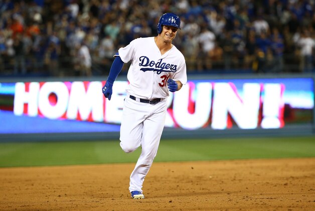 LOS ANGELES, CA - APRIL 27:  Joc Pederson #31 of the Los Angeles Dodgers smiles as he rounds the bases on his solo home run in the sixth inning against the San Francisco Giants during the MLB game at Dodger Stadium on April 27, 2015 in Los Angeles, California.  (Photo by Victor Decolongon/Getty Images)