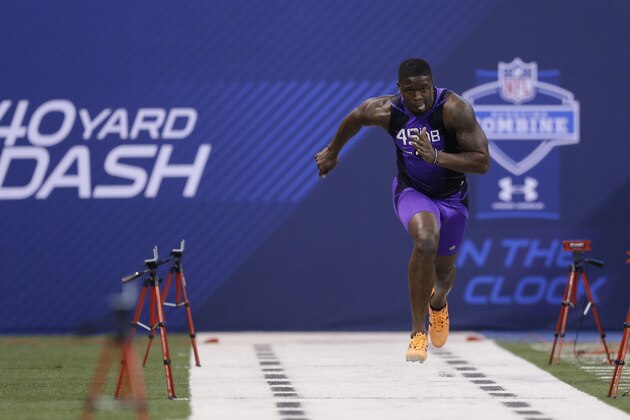 Samford defensive back Jaquiski Tartt runs the 40-yard dash at the NFL football scouting combine in Indianapolis, Monday, Feb. 23, 2015. (AP Photo/Julio Cortez)