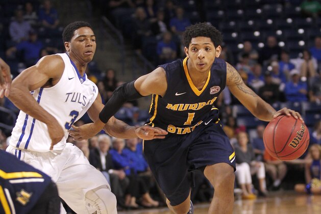 Murray State's Cameron Payne drives around Tulsa's Shaquille Harrison during the second half of an NCAA college basketball game in the National Invitation Tournament, Monday, March 23, 2015, in Tulsa, Okla. Murray State beat Tulsa 83-62. (AP Photo/Dave Crenshaw)