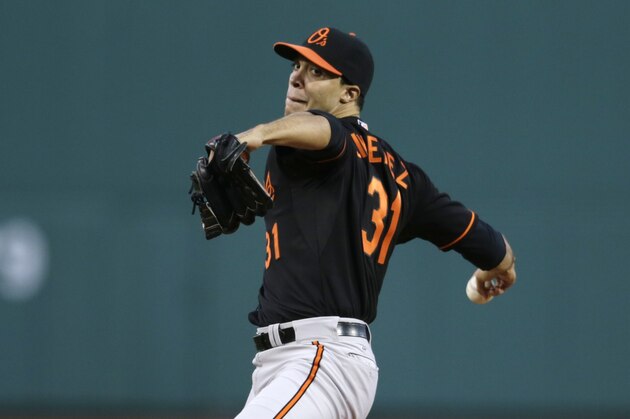 Baltimore Orioles starting pitcher Ubaldo Jimenez delivers against the Boston Red Sox during the first inning of a MLB baseball game at Fenway Park in Boston, Friday, April 17, 2015. (AP Photo/Charles Krupa)