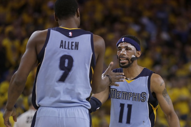 Memphis Grizzlies forward Tony Allen (9) and guard Mike Conley (11) react during the second half of Game 2 in a second-round NBA playoff basketball series against the Golden State Warriors in Oakland, Calif., Tuesday, May 5, 2015. (AP Photo/Ben Margot)