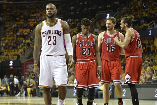 May 4, 2015; Cleveland, OH, USA; Cleveland Cavaliers forward LeBron James (23) reacts beside Chicago Bulls guard Jimmy Butler (21), forward Pau Gasol (16) and center Joakim Noah (13) in the third quarter in game one of the second round of the NBA Playoffs at Quicken Loans Arena. Mandatory Credit: David Richard-USA TODAY Sports
