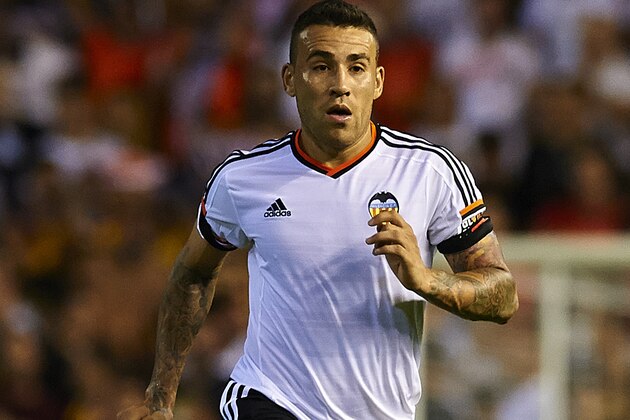 VALENCIA, SPAIN - AUGUST 29:  Nicolas Otamendi of Valencia runs with the ball during the La Liga match between Valencia CF and Malaga CF at Estadi de Mestalla on August 29, 2014 in Valencia, Spain.  (Photo by Manuel Queimadelos Alonso/Getty Images)