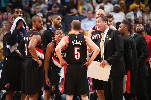 MEMPHIS, TN - APRIL 29:  Terry Stotts of the Portland Trail Blazers speaks with his team during a time-out against the Memphis Grizzlies in Game Five of the Western Conference Quarterfinals of the NBA Playoffs at FedExForum on April 29, 2015 in Memphis, Tennessee. NOTE TO USER: User expressly acknowledges and agrees that, by downloading and or using this photograph, User is consenting to the terms and conditions of the Getty Images License Agreement. Mandatory Copyright Notice: Copyright 2015 NBAE (Photo by Joe Murphy/NBAE via Getty Images)