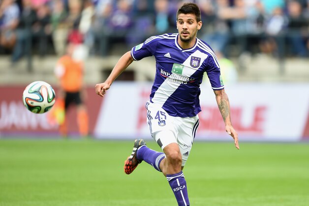 BRUSSELS, BELGIUM - AUGUST 24:  Alexandar Mitrovic of Anderlecht in action during the Belgiun Jupilar League match between RSC Anderlecht and Waasland-Beveren at Constant Vanden Stock Stadium on August 24, 2014 in Brussels, Belgium.  (Photo by Kaz Photography/Getty Images)