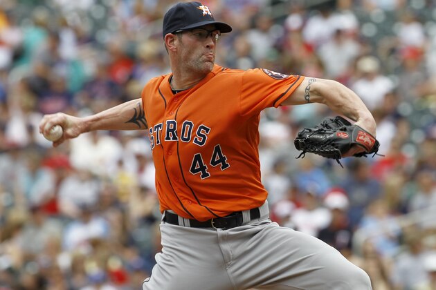 Houston Astros relief pitcher Kyle Farnsworth (44) delivers to the Minnesota Twins during the seventh inning of a baseball game in Minneapolis, Sunday, June 8, 2014. The Astros won 14-5.(AP Photo/Ann Heisenfelt) Houston Astros relief pitcher Kyle Farnsworth (44) delivers to the Minnesota Twins during the seventh inning of a baseball game in Minneapolis, Sunday, June 8, 2014. The Astros won 14-5.(AP Photo/Ann Heisenfelt)