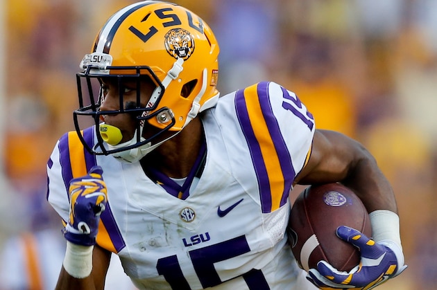 Sep 20, 2014; Baton Rouge, LA, USA; LSU Tigers wide receiver Malachi Dupre (15) runs after a catch against the Mississippi State Bulldogs during the first half of a game at Tiger Stadium. Mandatory Credit: Derick E. Hingle-USA TODAY Sports