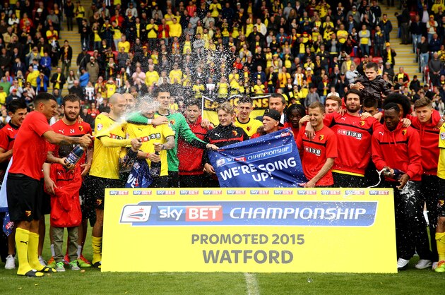 WATFORD, ENGLAND - MAY 02:  Watford celebrate promotion to the premier league after the Sky Bet Championship match between Watford and Sheffield Wednesday at Vicarage Road on May 2, 2015 in Watford, England.  (Photo by Richard Heathcote/Getty Images)