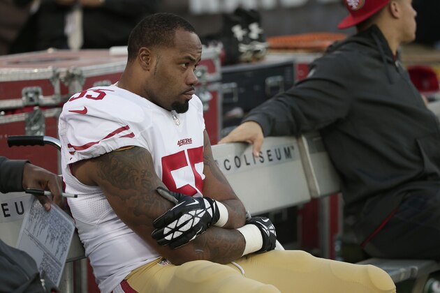 San Francisco 49ers linebacker Ahmad Brooks (55) sits on the bench during the fourth quarter of an NFL football game against the Oakland Raiders in Oakland, Calif., Sunday, Dec. 7, 2014. The Raiders won 24-13. (AP Photo/Marcio Jose Sanchez)
