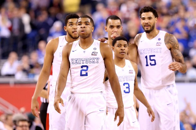INDIANAPOLIS, IN - APRIL 04: Aaron Harrison #2 of the Kentucky Wildcats reacts late in the game with teammates Karl-Anthony Towns #12, Tyler Ulis #3, Trey Lyles #41 and Willie Cauley-Stein #15 against the Wisconsin Badgers during the NCAA Men's Final Four Semifinal at Lucas Oil Stadium on April 4, 2015 in Indianapolis, Indiana.  (Photo by Streeter Lecka/Getty Images)