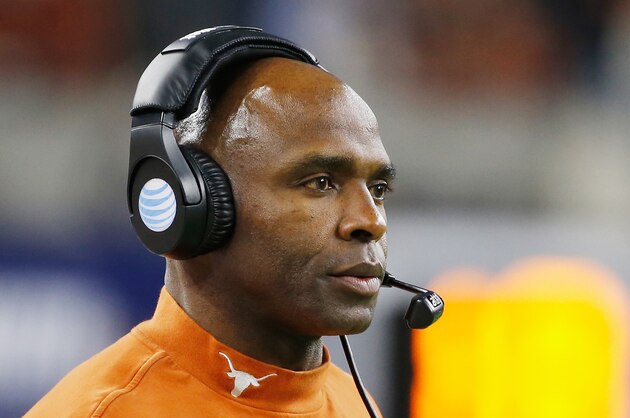 HOUSTON, TX - DECEMBER 29:  Head coach Charlie Strong of the Texas Longhorns waits near the sideline during the first half of the game against the Arkansas Razorbacks at the AdvoCare V100 Texas Bowl at NRG Stadium on December 29, 2014 in Houston, Texas.  (Photo by Scott Halleran/Getty Images)