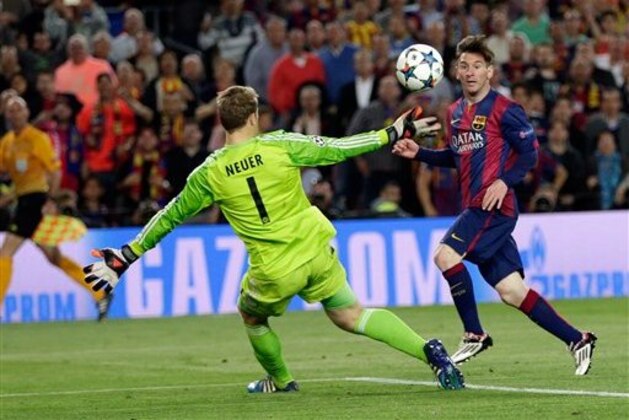 Barcelona's Lionel Messi, right, scores his second goal past Bayern's goalkeeper Manuel Neuer during the Champions League semifinal first leg soccer match between Barcelona and Bayern Munich at the Camp Nou stadium in Barcelona, Spain, Wednesday, May 6, 2015.  (AP Photo/Emilio Morenatti)