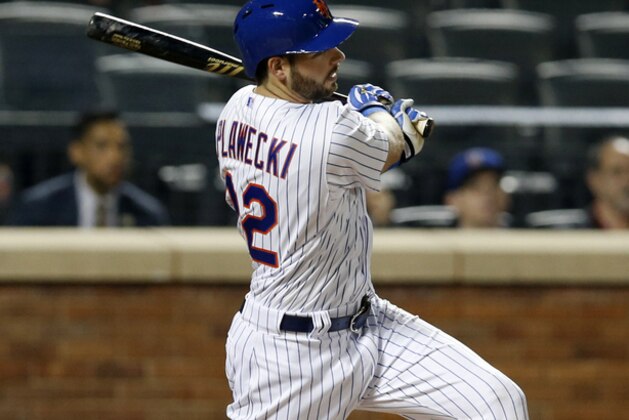 New York Mets Kevin Plawecki (22) hits a fourth-inning, two-run double in a baseball game against the Baltimore Orioles in New York, Tuesday, May 5, 2015. (AP Photo/Kathy Willens)