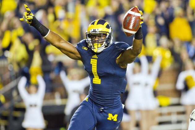 Michigan wide receiver Devin Funchess (1) celebrates a touchdown in the first quarter of an NCAA college football game against Penn State in Ann Arbor, Mich., Saturday, Oct. 11, 2014. Michigan won 18-13. (AP Photo/Tony Ding)