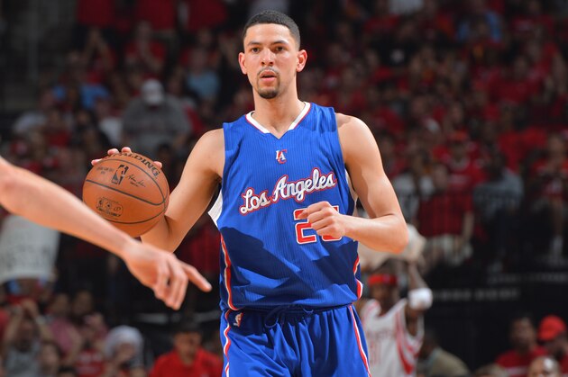 HOUSTON,TEXAS : Austin Rivers #25 of the Los Angeles Clippers dribbles up court against the Houston Rockets at the Toyota Center During Game One of the Western Conference Semifinals during the 2015 NBA Playoffs on May 4, 2015 in Houston,Texas NOTE TO USER: User expressly acknowledges and agrees that, by downloading and/or using this Photograph, user is consenting to the terms and conditions of the Getty Images License Agreement. Mandatory Copyright Notice: Copyright 2015 NBAE (Photo by Jesse D. Garrabrant/NBAE via Getty Images)