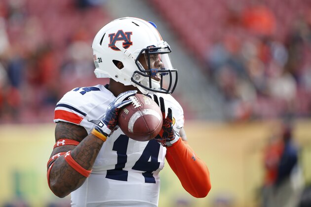 TAMPA, FL - JANUARY 1: Quarterback Nick Marshall #14 of the Auburn Tigers warms up before the start of the Outback Bowl against the Wisconsin Badgers on January 1, 2015 at Raymond James Stadium in Tampa, Florida.  (Photo by Brian Blanco/Getty Images)
