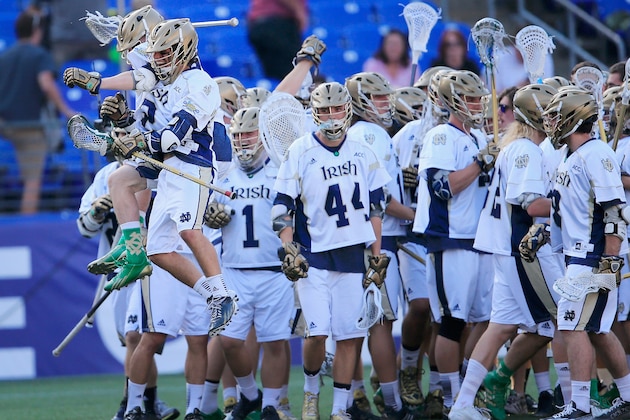 BALTIMORE, MD - MAY 24: Members of the Notre Dame Fighting Irish celebrate following their 11-6 win over the Maryland Terrapins during the semifinals of the 2014 NCAA Division I Men's Lacrosse Championship at M&T Bank Stadium on May 24, 2014 in Baltimore, Maryland.  (Photo by Rob Carr/Getty Images)