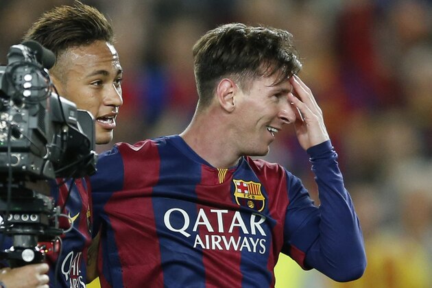 Barcelona's Neymar, left, and Lionel Messi celebrate after winning 3-0 in the Champions League semifinal first leg soccer match between Barcelona and Bayern Munich at the Camp Nou stadium in Barcelona, Spain, Wednesday, May 6, 2015.  (AP Photo/Manu Fernandez)