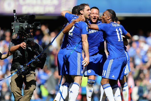 LONDON, ENGLAND - MAY 03:  John Terry (C) and Branislav Ivanovic (L) and Didier Drogba of Chelsea (R) celebrate winning the Premier League title after the Barclays Premier League match between Chelsea and Crystal Palace at Stamford Bridge on May 3, 2015 in London, England.  (Photo by Clive Mason/Getty Images)