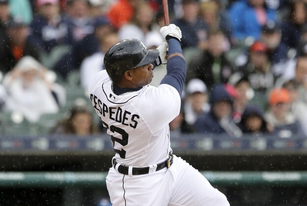 DETROIT, MI - APRIL 19:  Yoenis Cespedes #52 of the Detroit Tigers hits a grand slam off of Jose Quintana of the Chicago White Sox in the first inning at Comerica Park on April 19, 2015 in Detroit, Michigan. (Photo by Duane Burleson/Getty Images)