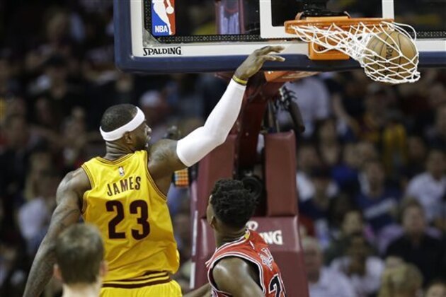 Cleveland Cavaliers forward LeBron James (23) dunks the ball against the Chicago Bulls during the first half of Game 2 in a second-round NBA basketball playoff series Wednesday, May 6, 2015, in Cleveland. (AP Photo/Tony Dejak)