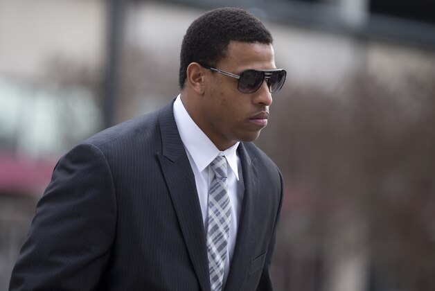 Carolina Panthers' defensive end Greg Hardy arrives at the Mecklenburg County Courthouse on the first day of his domestic violence appeal trial in Charlotte, N.C., Monday, Feb. 9, 2015. Hardy was convicted on two counts of domestic violence in a bench trial last summer and only played one game in 2014. (AP Photo/Chris Keane)