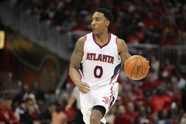 May 3, 2015; Atlanta, GA, USA; Atlanta Hawks guard Jeff Teague (0) drives to the basket against the Washington Wizards in the third quarter in game one of the second round of the NBA Playoffs at Philips Arena. Mandatory Credit: Brett Davis-USA TODAY Sports